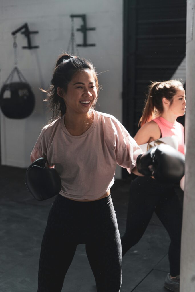 Woman boxing in a Manhattan gym to help improve her self esteem. 