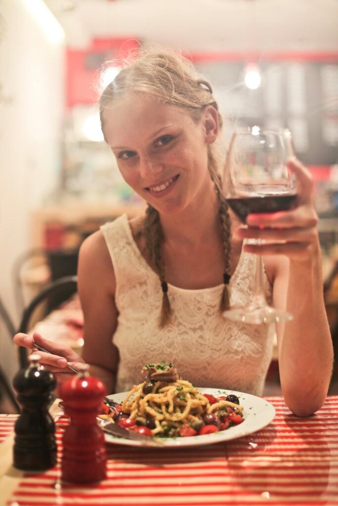 A New York City woman enjoying her dinner after treatment for an eating disorder. 