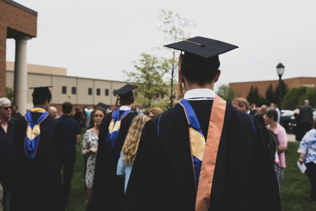 New York student graduating. Stress about academics can cause performance issues. But therapy can help. 