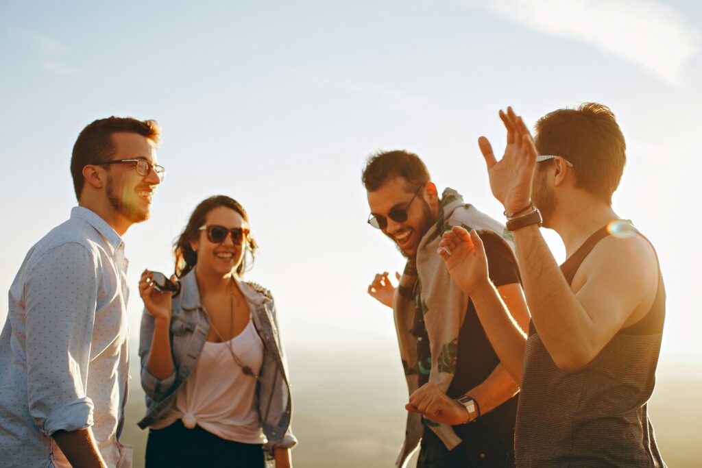 Group of Manhattan friends enjoying the summer months with each other. 