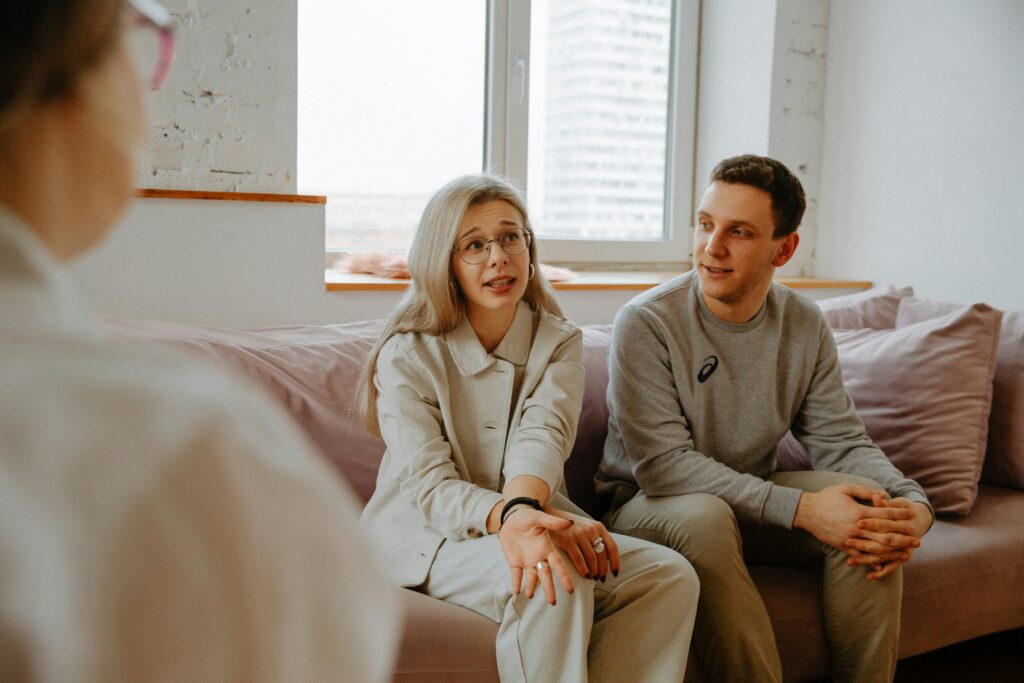 Couple sitting in couple's therapy together.