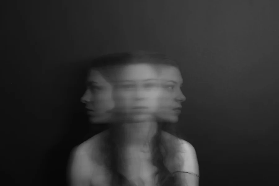Black and white picture of a woman with dizzy head spinning into 3 images. This woman could benefit from tips form a depression therapist. If you get feelings like this get support with depression treatment for women in Brooklyn or Manhattan.