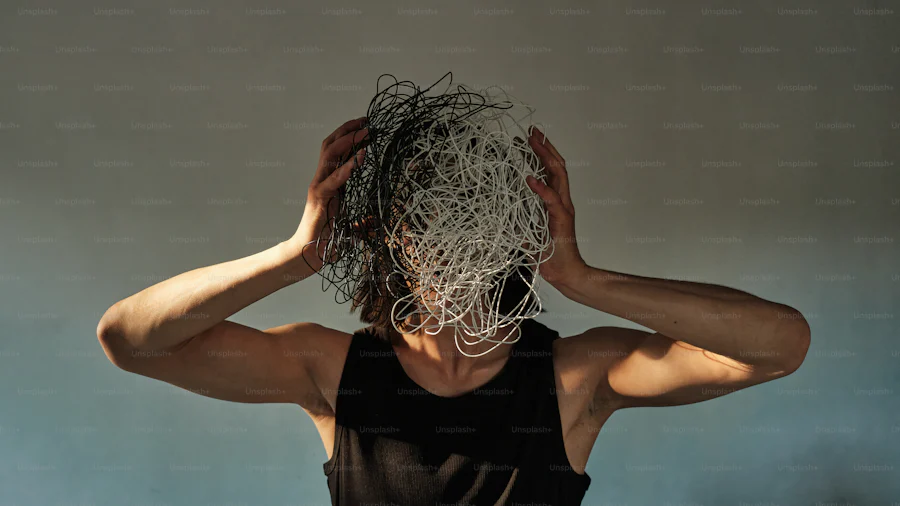 Woman holding her head with knotted wires showing crazy thoughts.