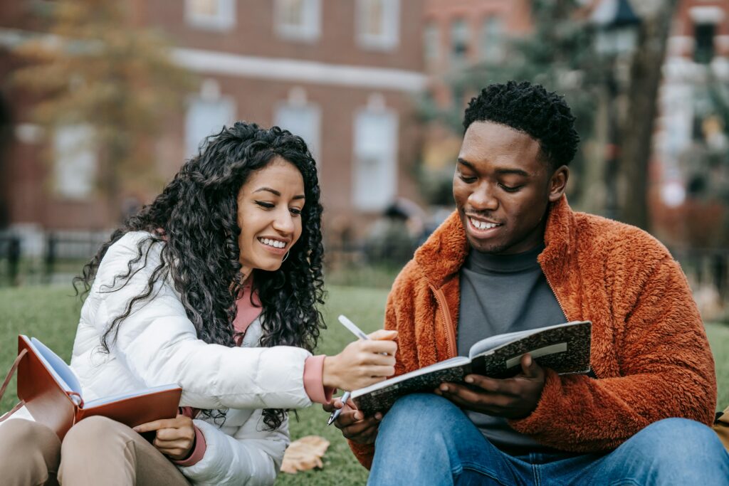 Students studying together outside.