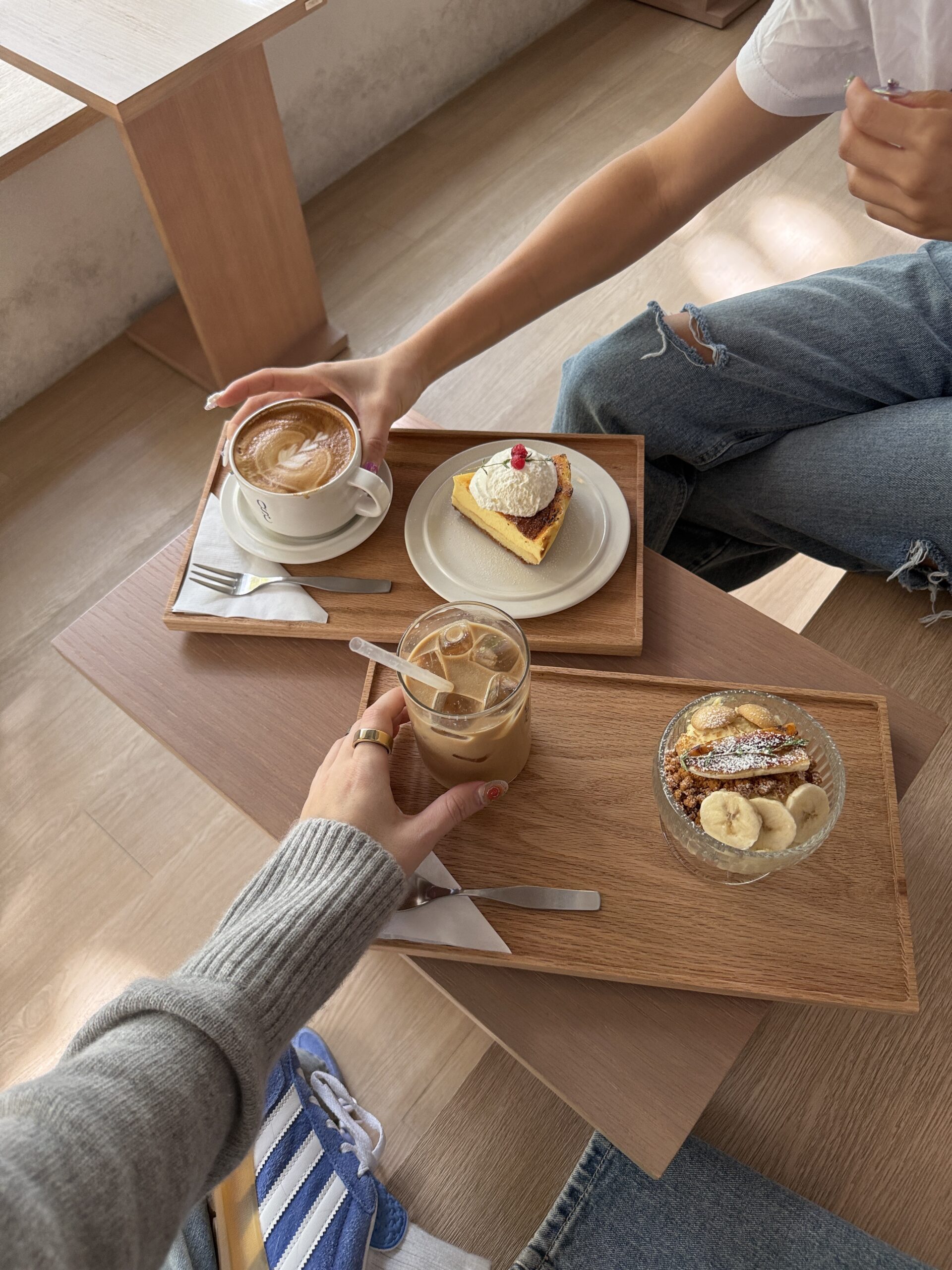 Friends eating lunch and coffee together.