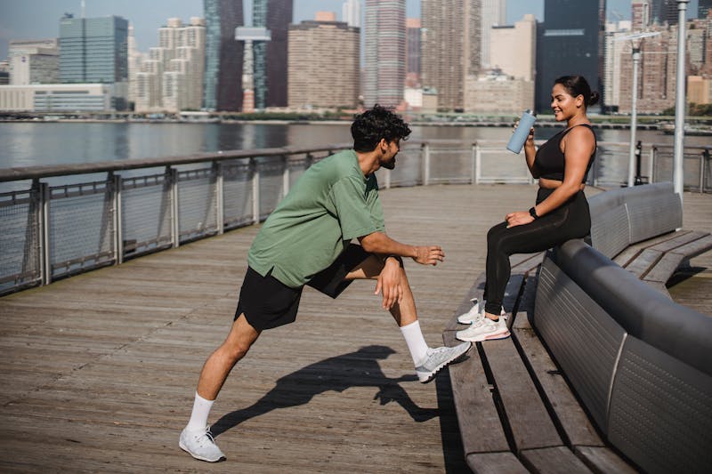Friends going for a run outside together in the city.