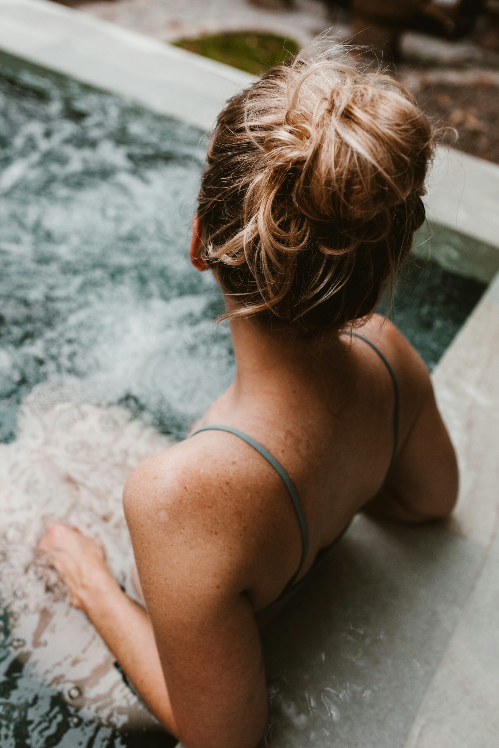 Woman relaxing in the pool.
