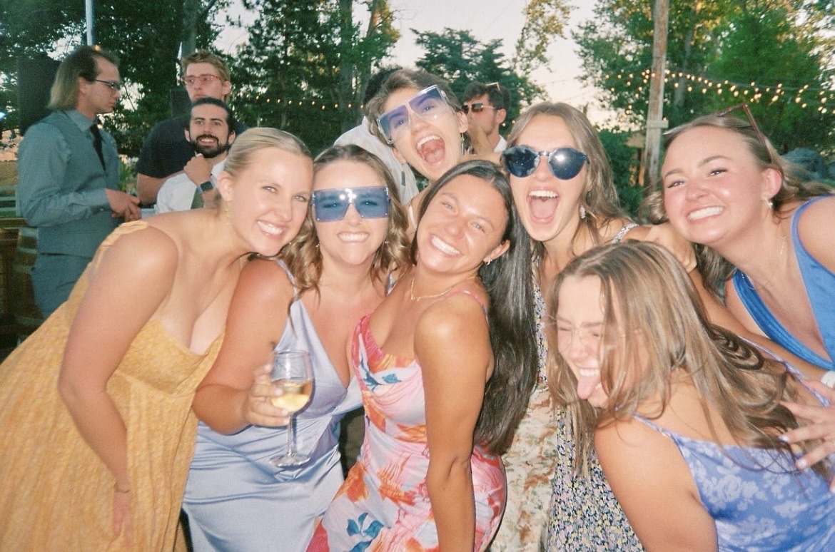 College friends celebrating and happy together.