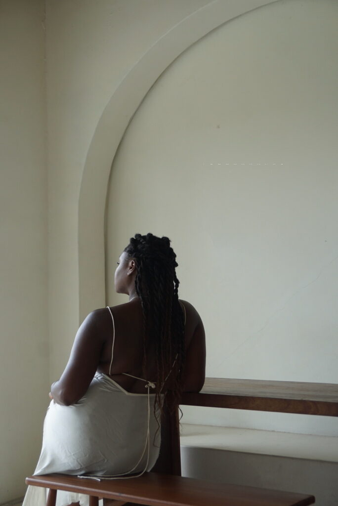 Girl confidently posing for a picture loving herself in Brooklyn