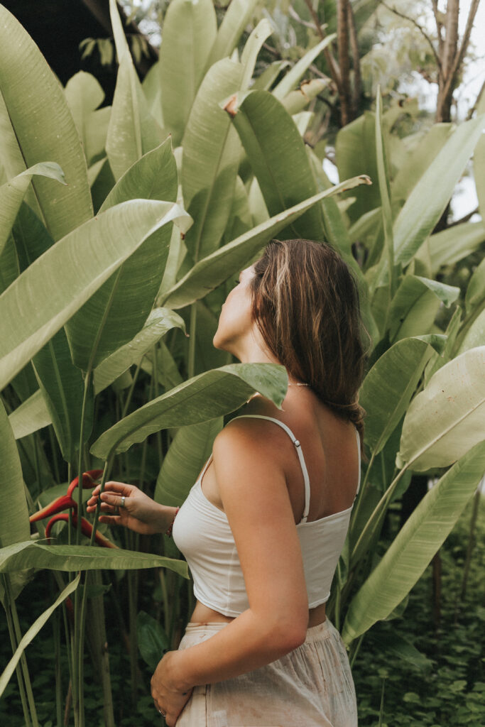 Woman posing confidently with a nature background in Manhattan 