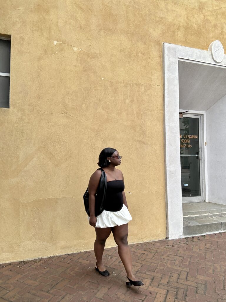 Woman walking on the street feeling independent on her own in New York.