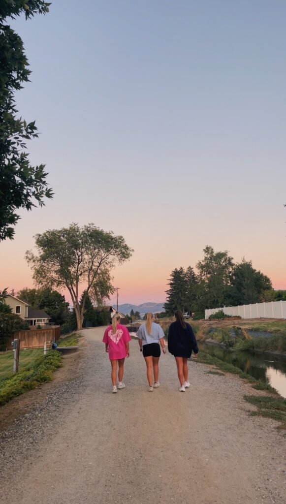Three friends hanging out and talking about their lives at Manhattan