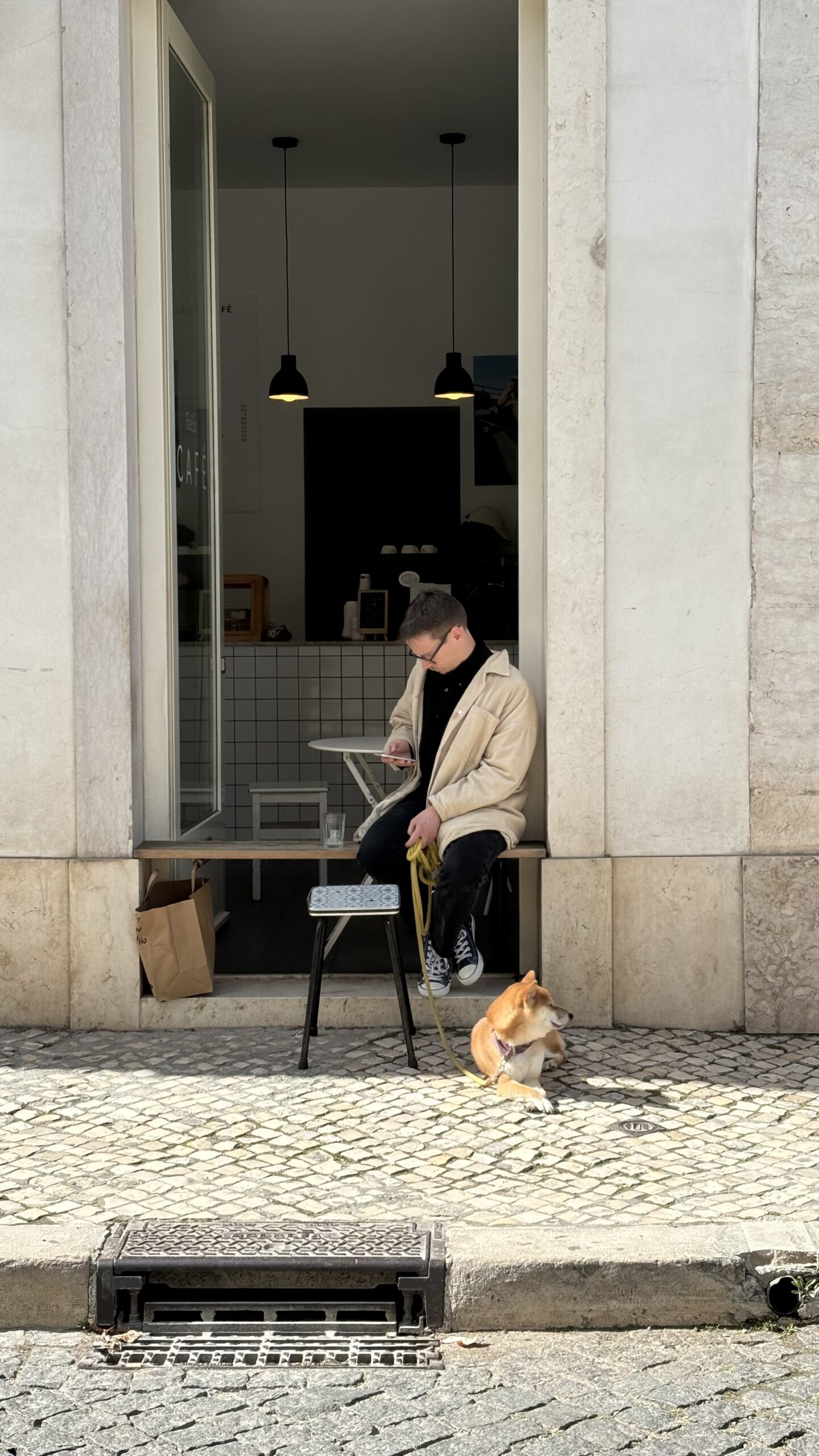 A man hanging out in a cafe keeping himself off from the stress at Brooklyn