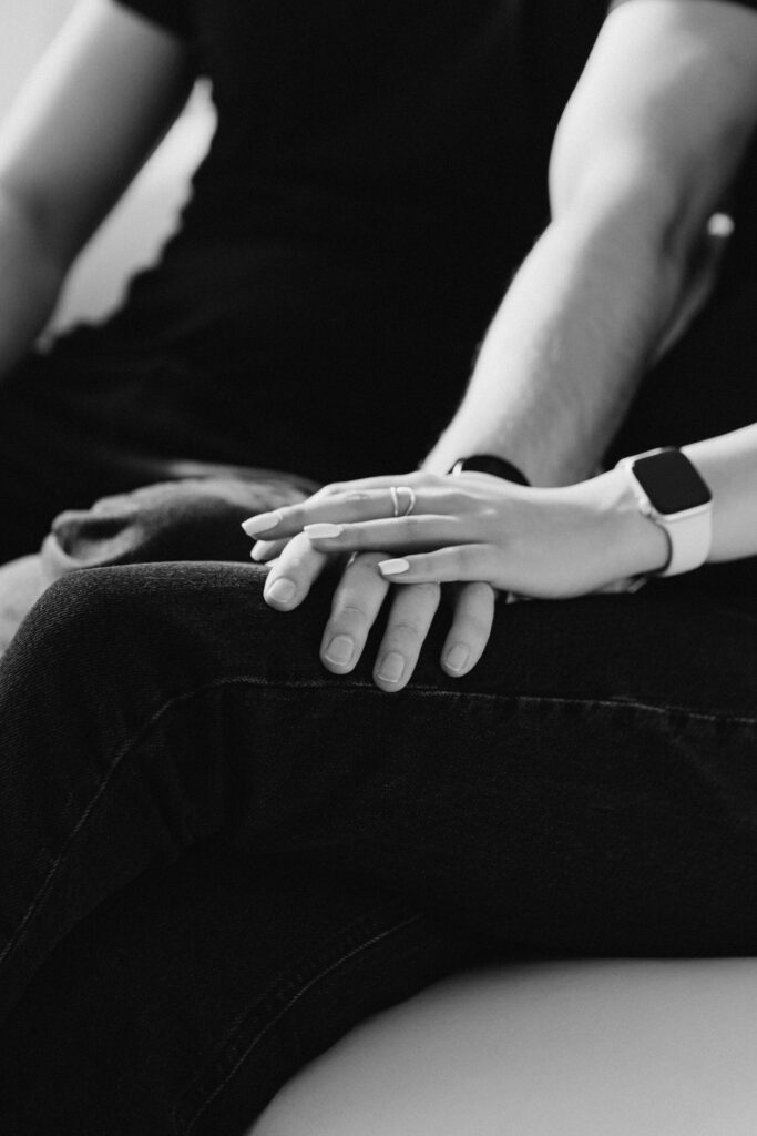 Couple holding hands while on a therapy session in Manhattan