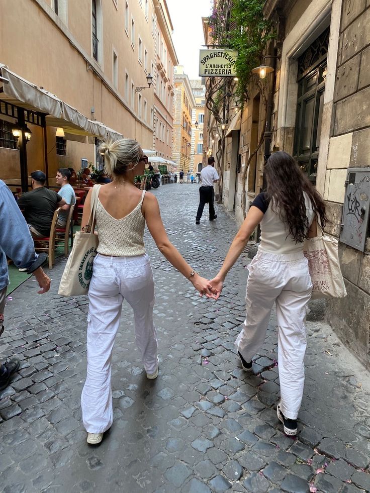 Couple admiring each other while walking and holding hands at New York