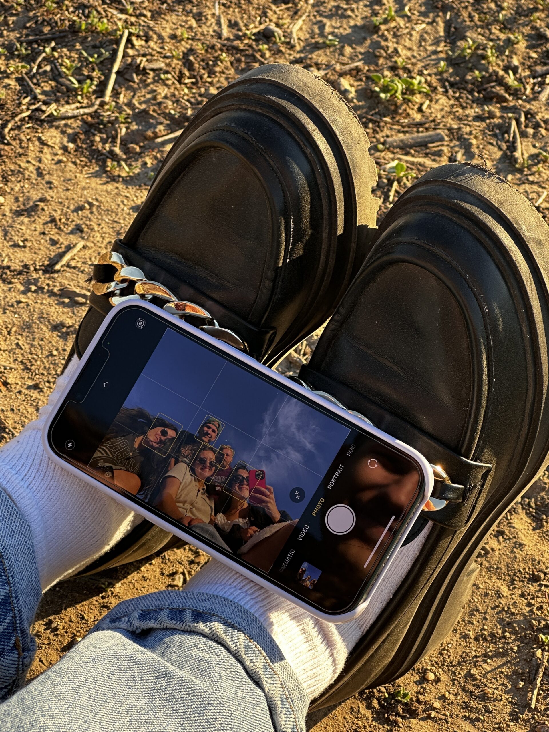 Friends taking pictures of themselves together at Brooklyn