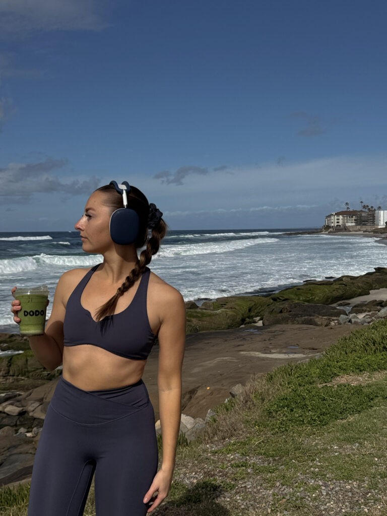 Girl going for a quick run and coffee by the beach at New York
