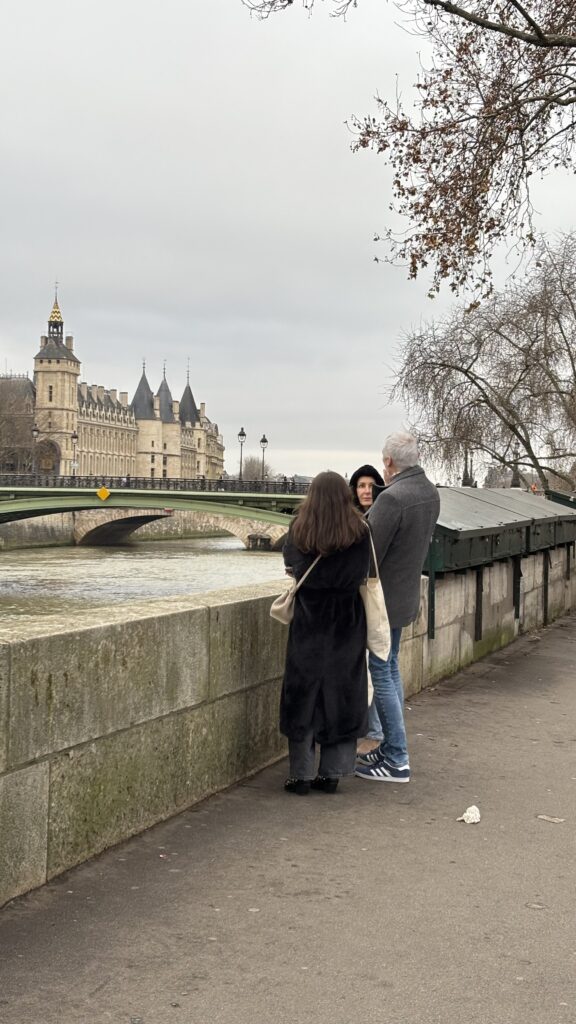 Girl talking awkwardly to her boyfriend's parents in New York
