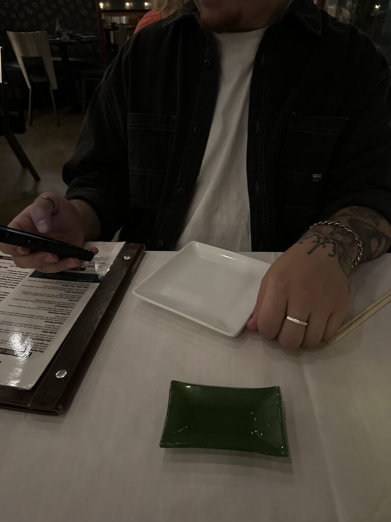 Man not paying attention to his date at New York
