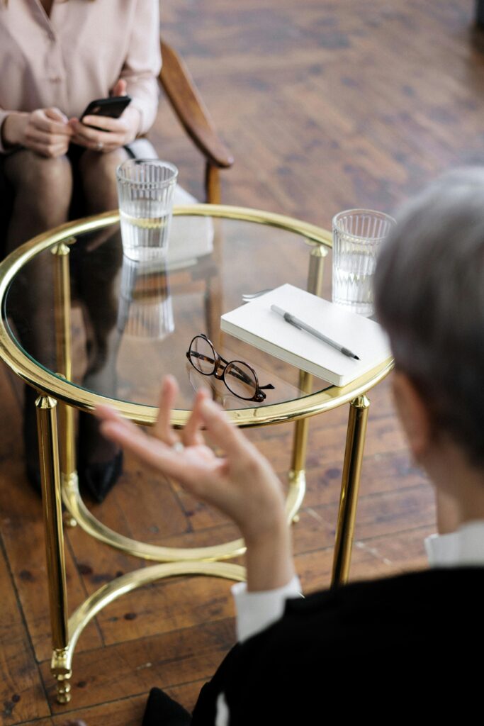 A woman talking to her therapist about her feelings in Manhattan
