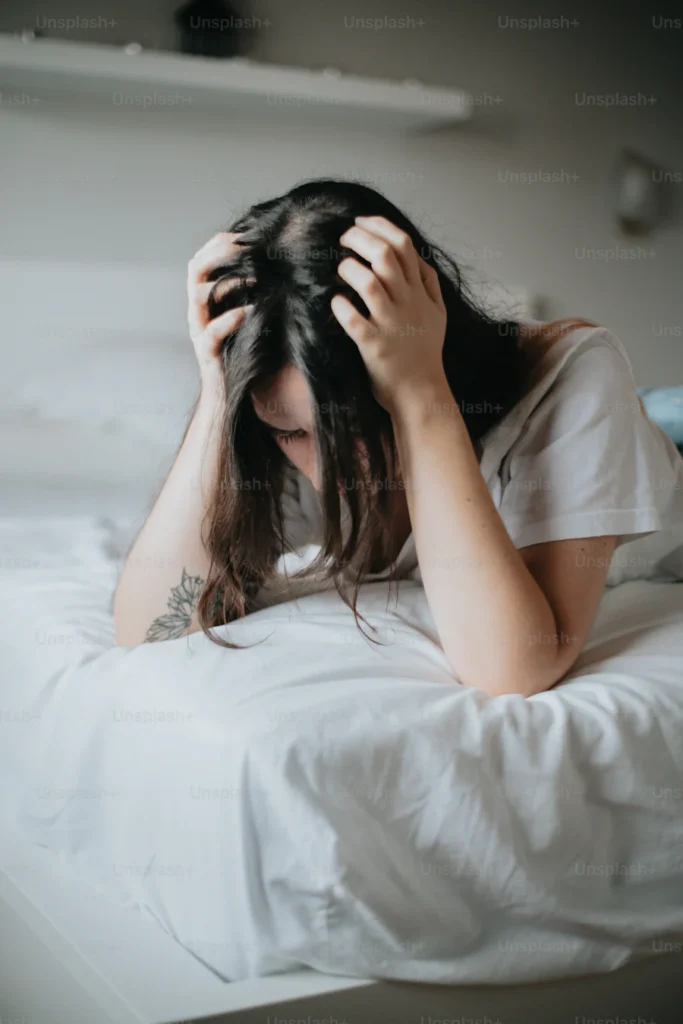 Woman overthinking how to release her stress at her house in Manhattan