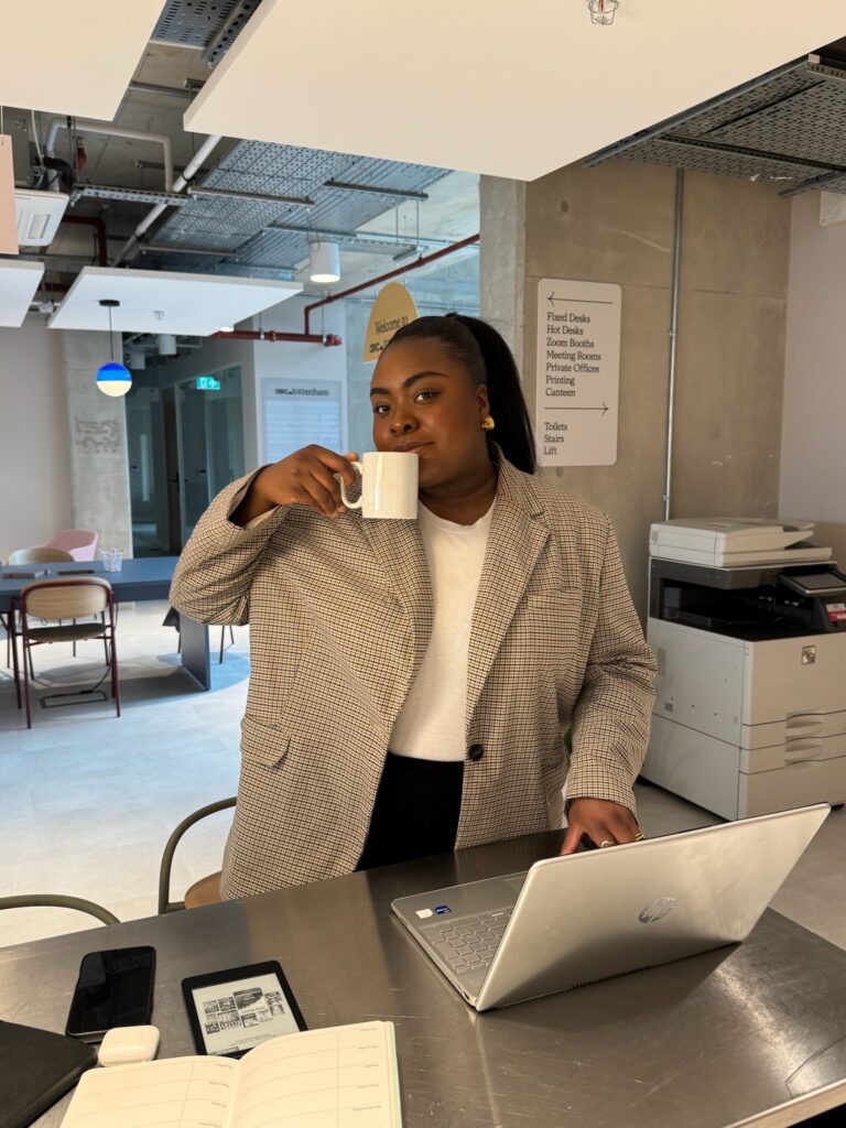 Woman in the office, highly capable and driven, quietly carries the weight of self-doubt as her sense of worth becomes tied to her performance and constant need to prove herself at Brooklyn