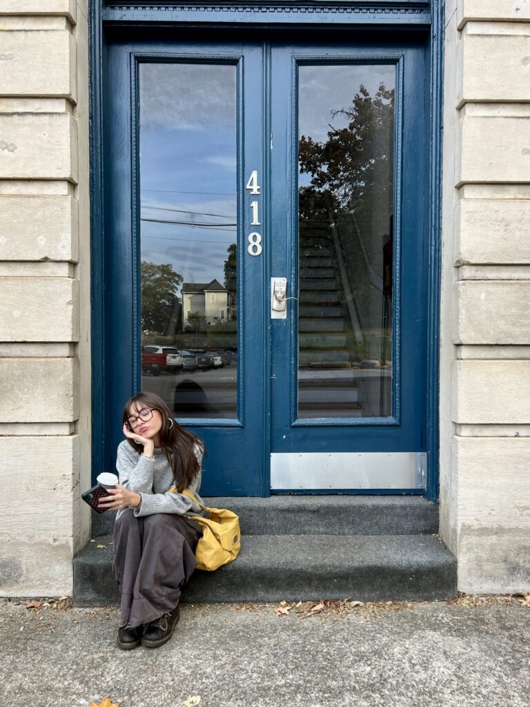 Woman waiting for hours for that one reply from someone at New York 