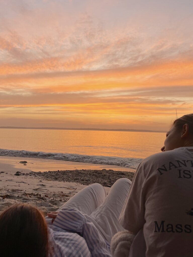 Couple talking about their relationship at the beach at New York