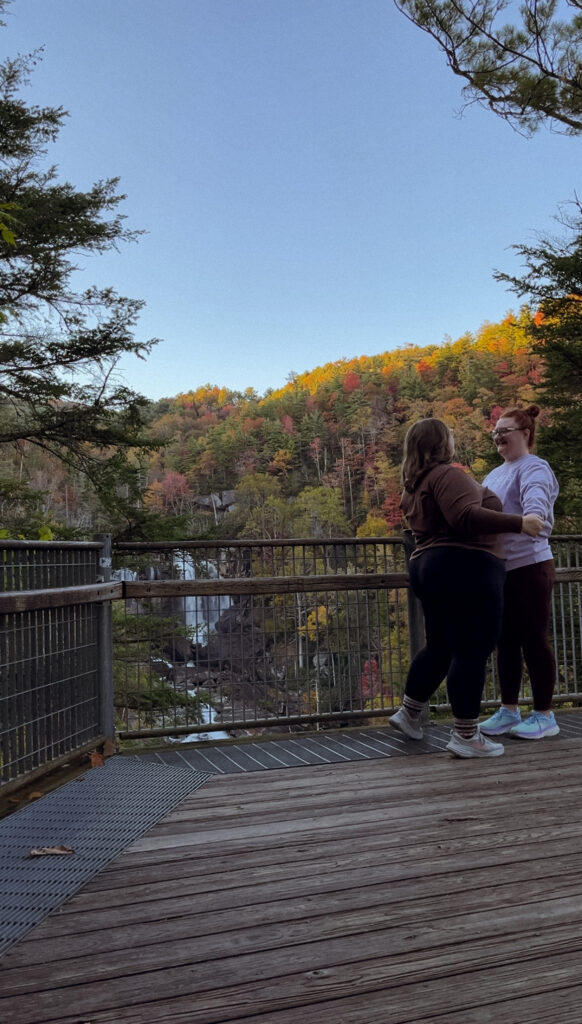 Couple happily talking to each other after resolving an argument at Manhattan