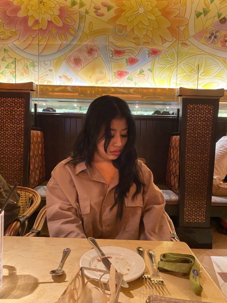 Girlfriend avoiding eye contact with her date at Manhattan