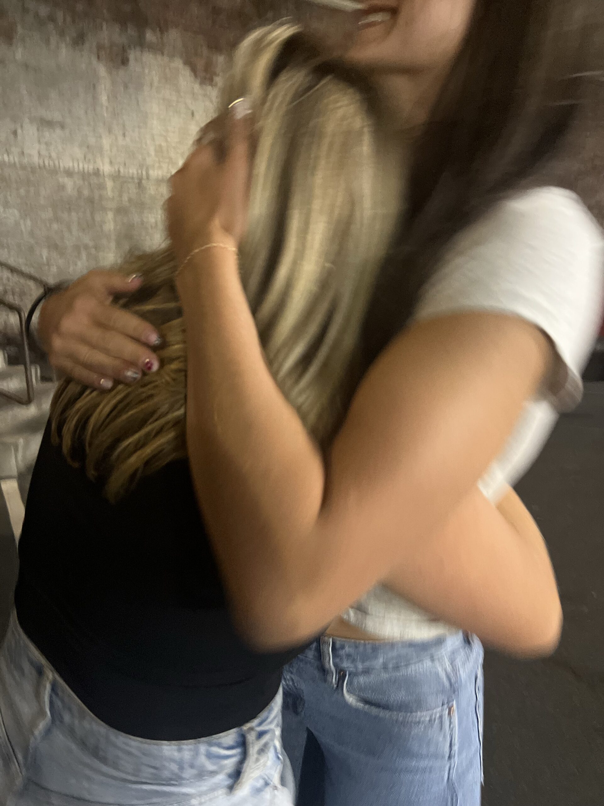 Couple hugging each other after a fight at Manhattan