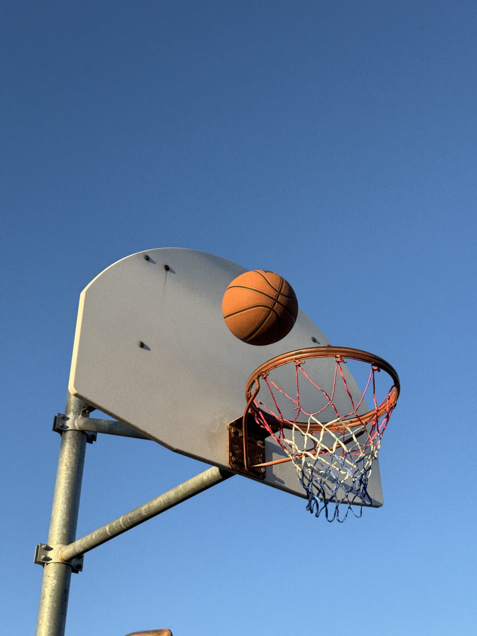 Basketball ring and ball at Manhattan
