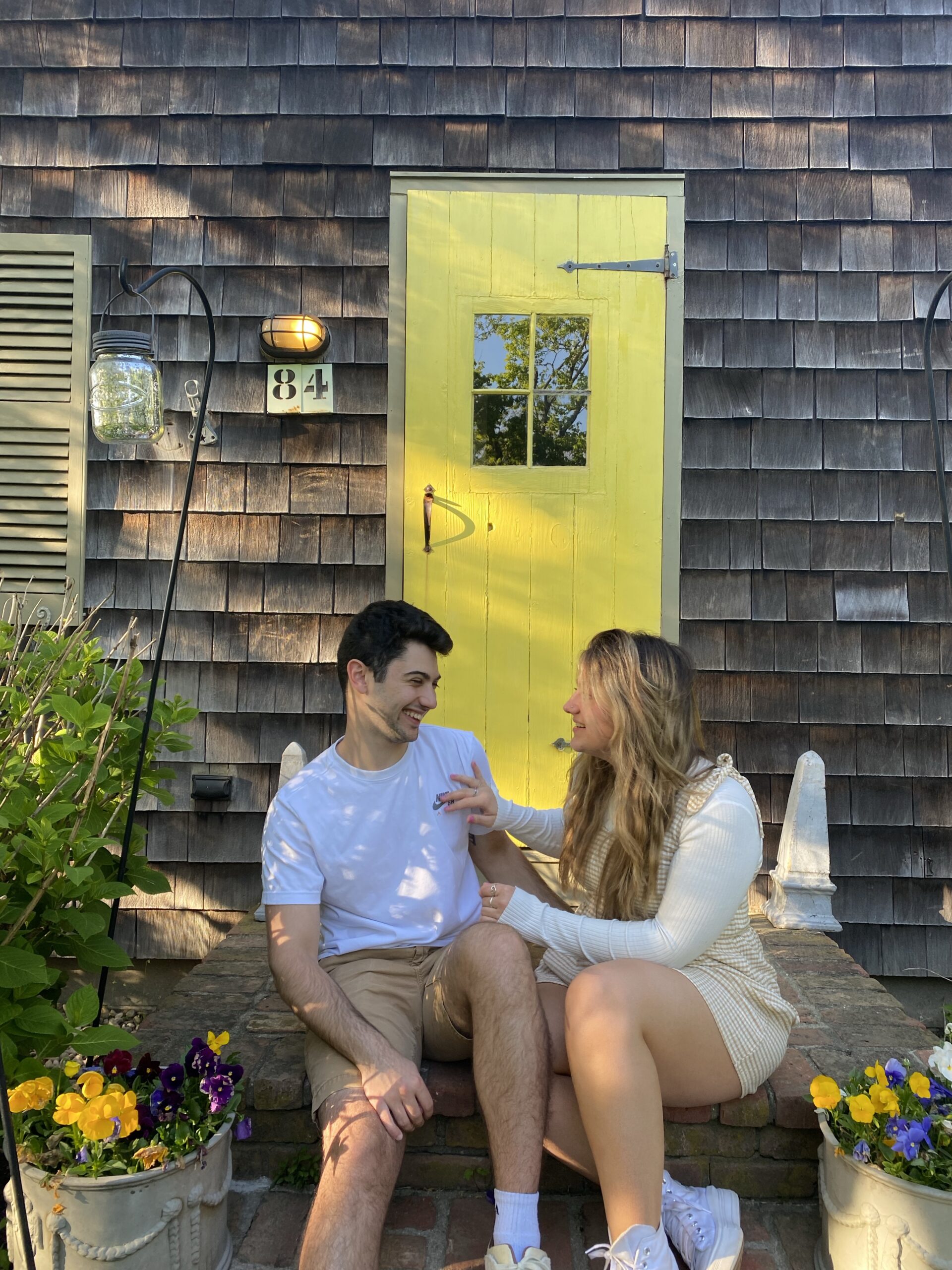 Young couple sitting together laughing and having fun at New York