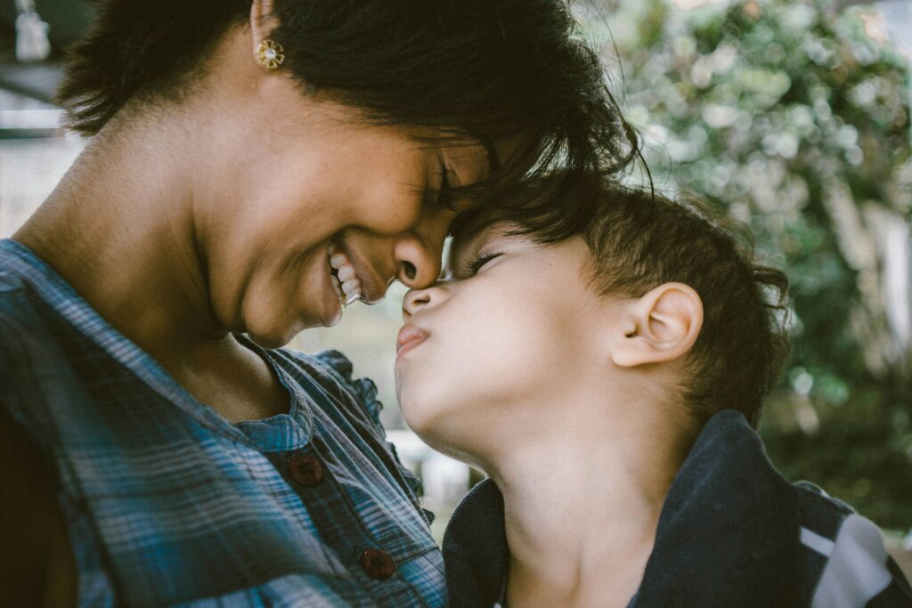 Mother with her youngest child smiling at New York