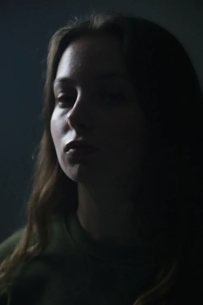 Girl looking tired from overthinking and anxiety at Brooklyn