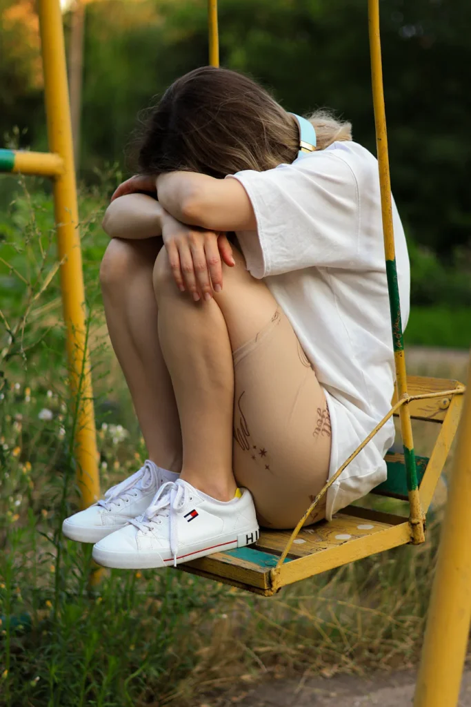 Woman alone and emotionally exhausted at Brooklyn
