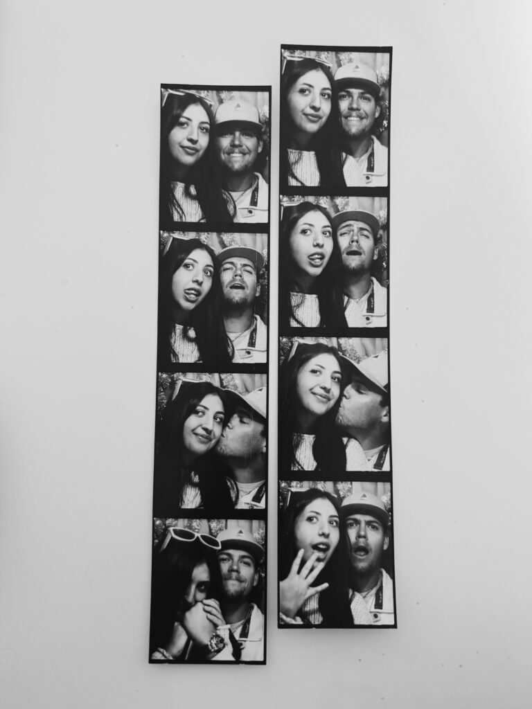 Young couple taking a polaroid picture to post on social media at New York