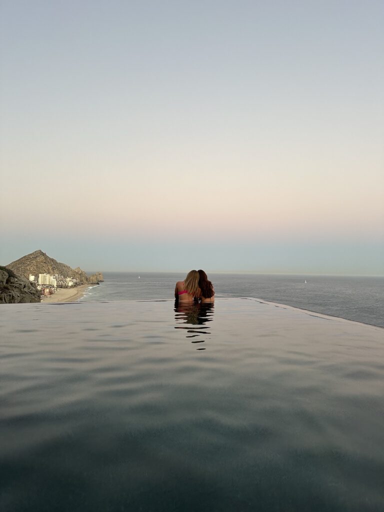 Intimate couple talking to each other genuinely at the pool at Brooklyn