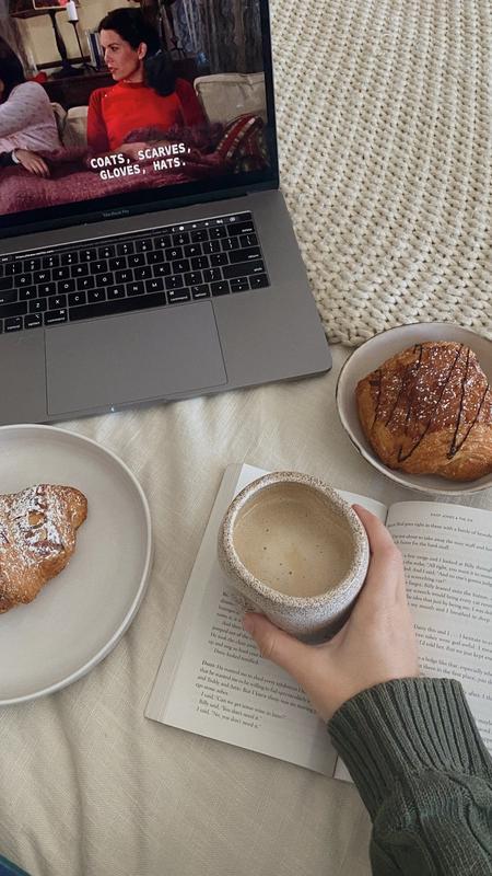 Woman enjoying her quiet summer breakfast at home in Brooklyn
