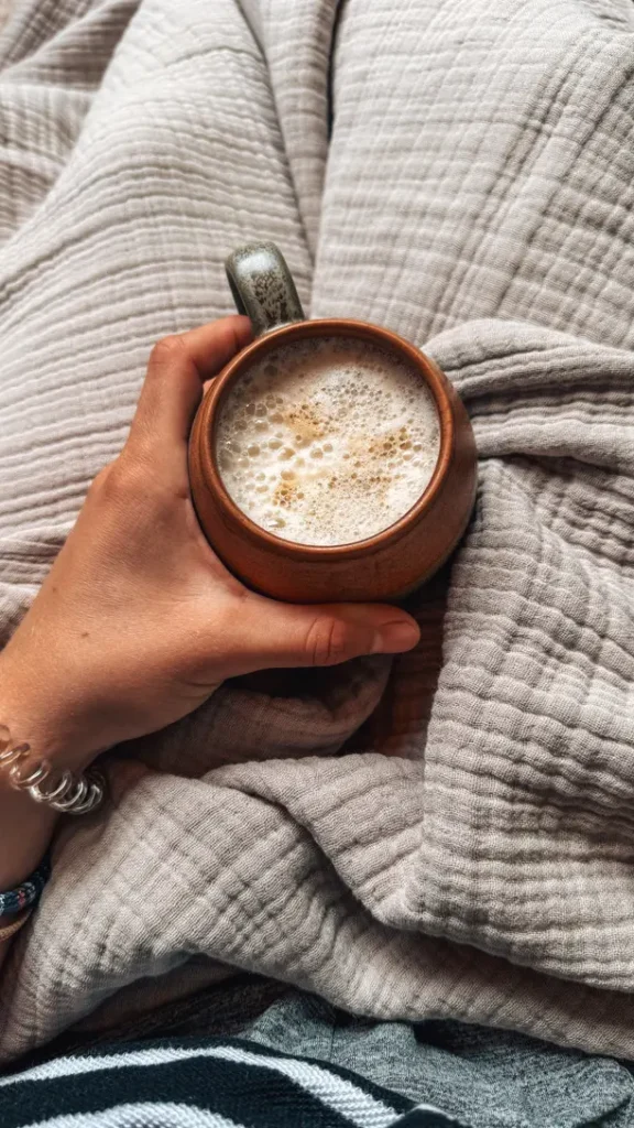 Young adult having a warm coffee in the morning at New York