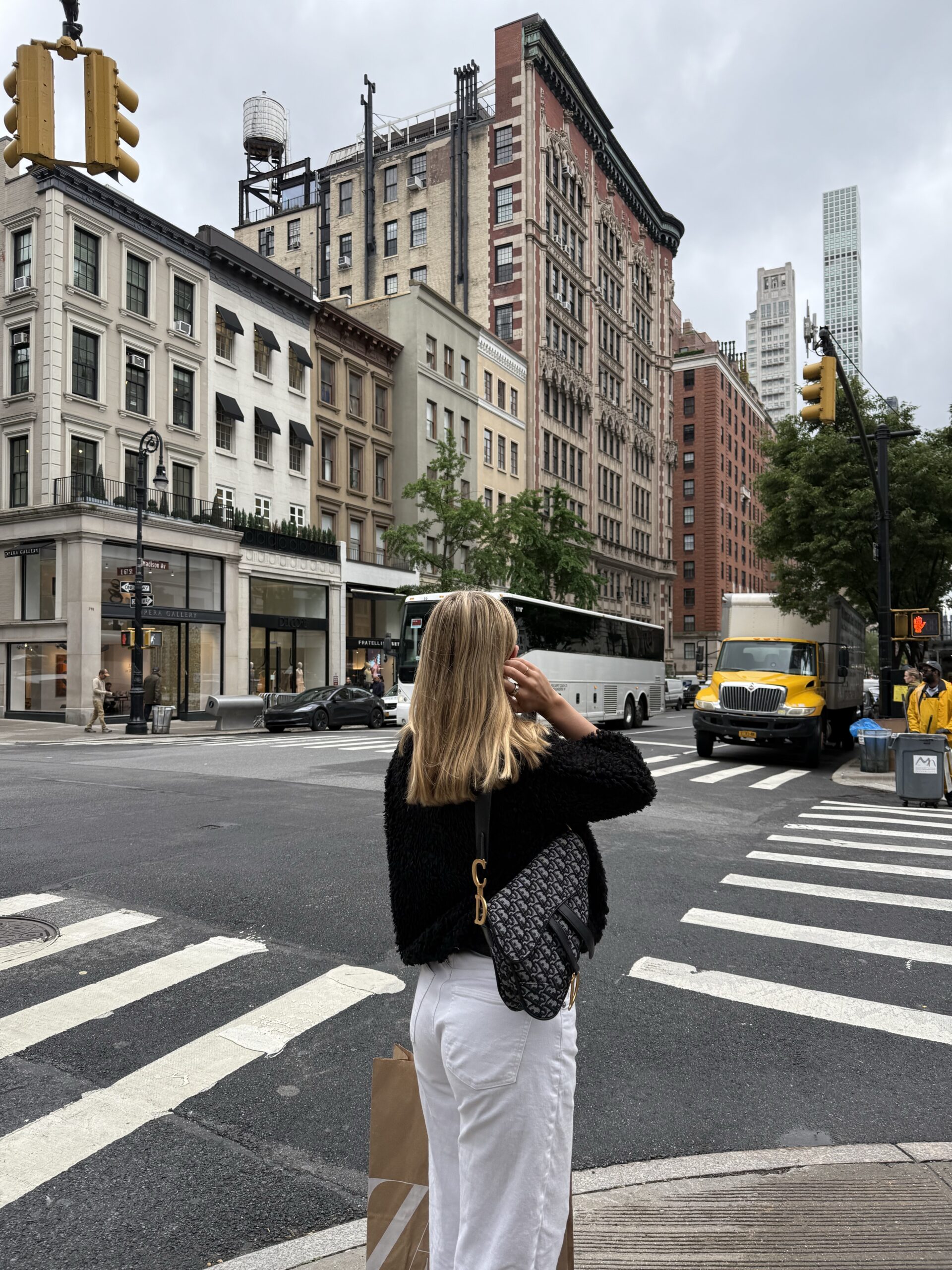 Woman looking thoughtfully at the view of the city at Manhattan