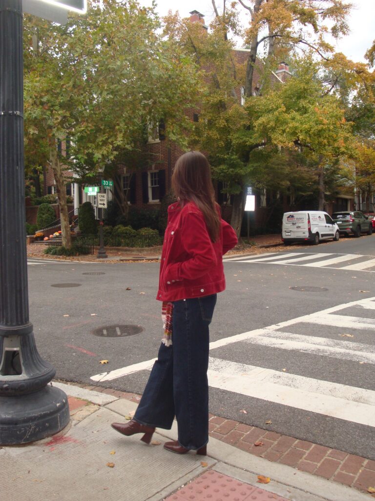 Woman standing and not knowing what to do feeling flatness at Manhattan