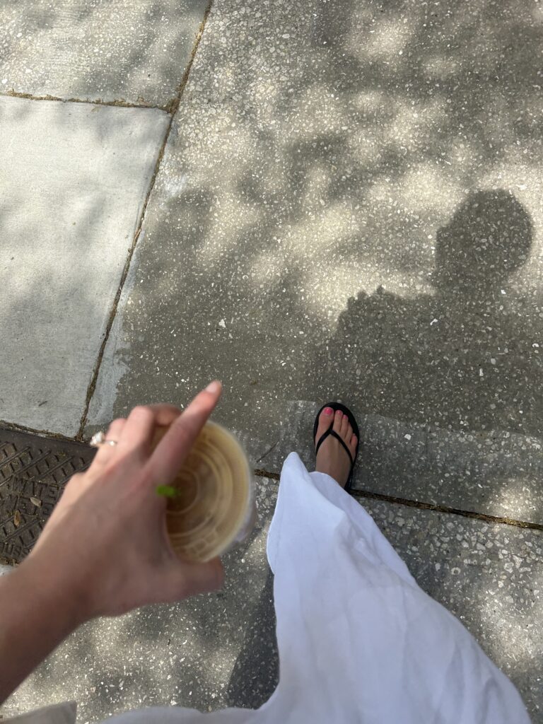 Woman walking alone to grab coffee at the street of Manhattan