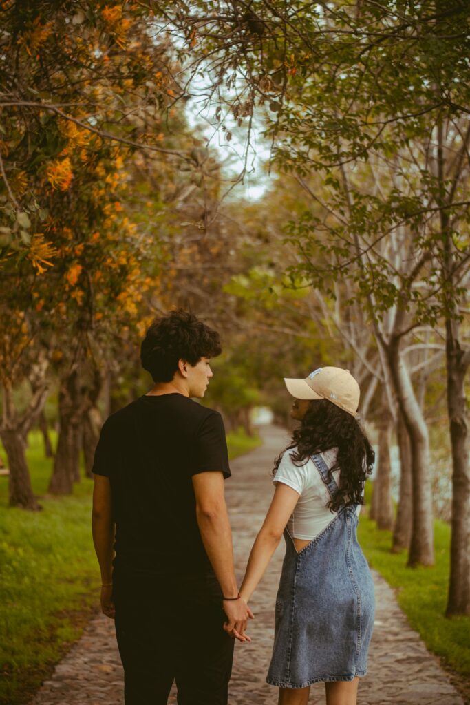 Couple holding hands while walking at New York
