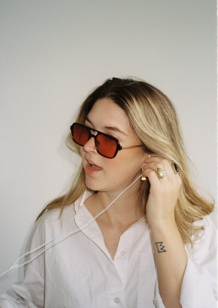 Woman listening to music and being reflective at Manhattan