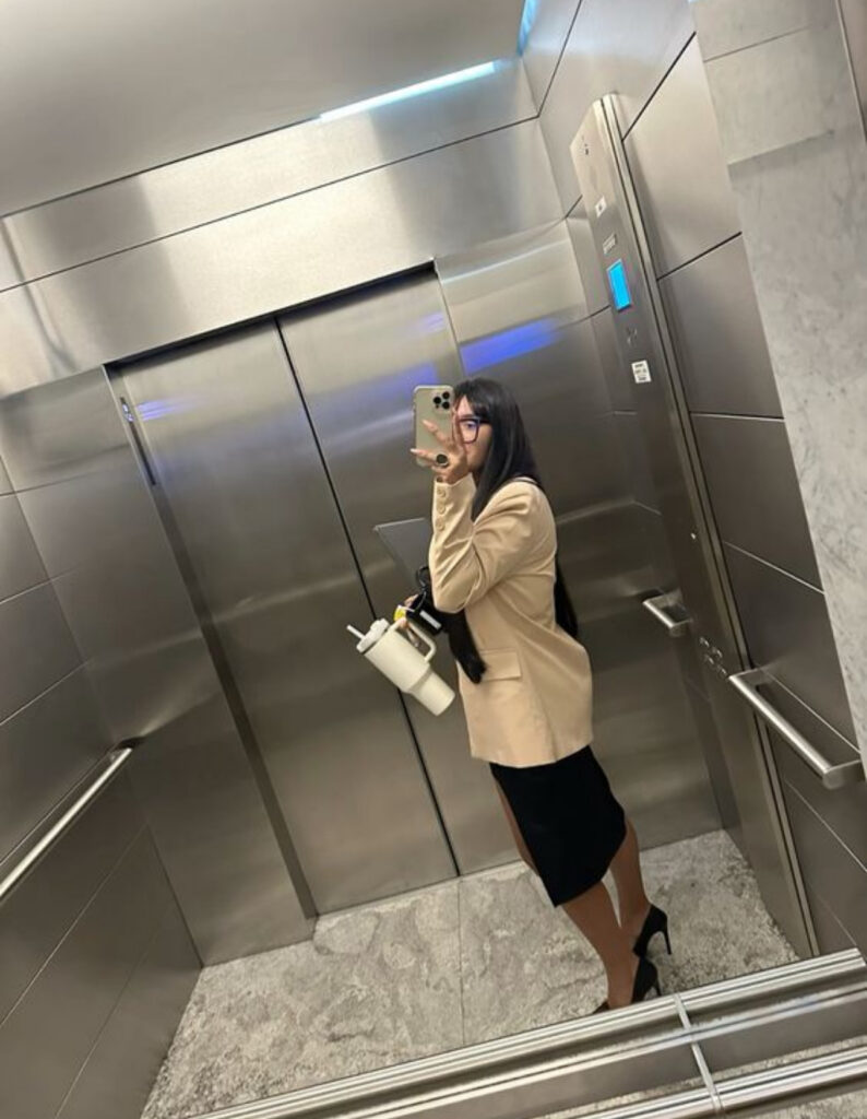 Woman on the way to work overtime avoiding rest at Manhattan