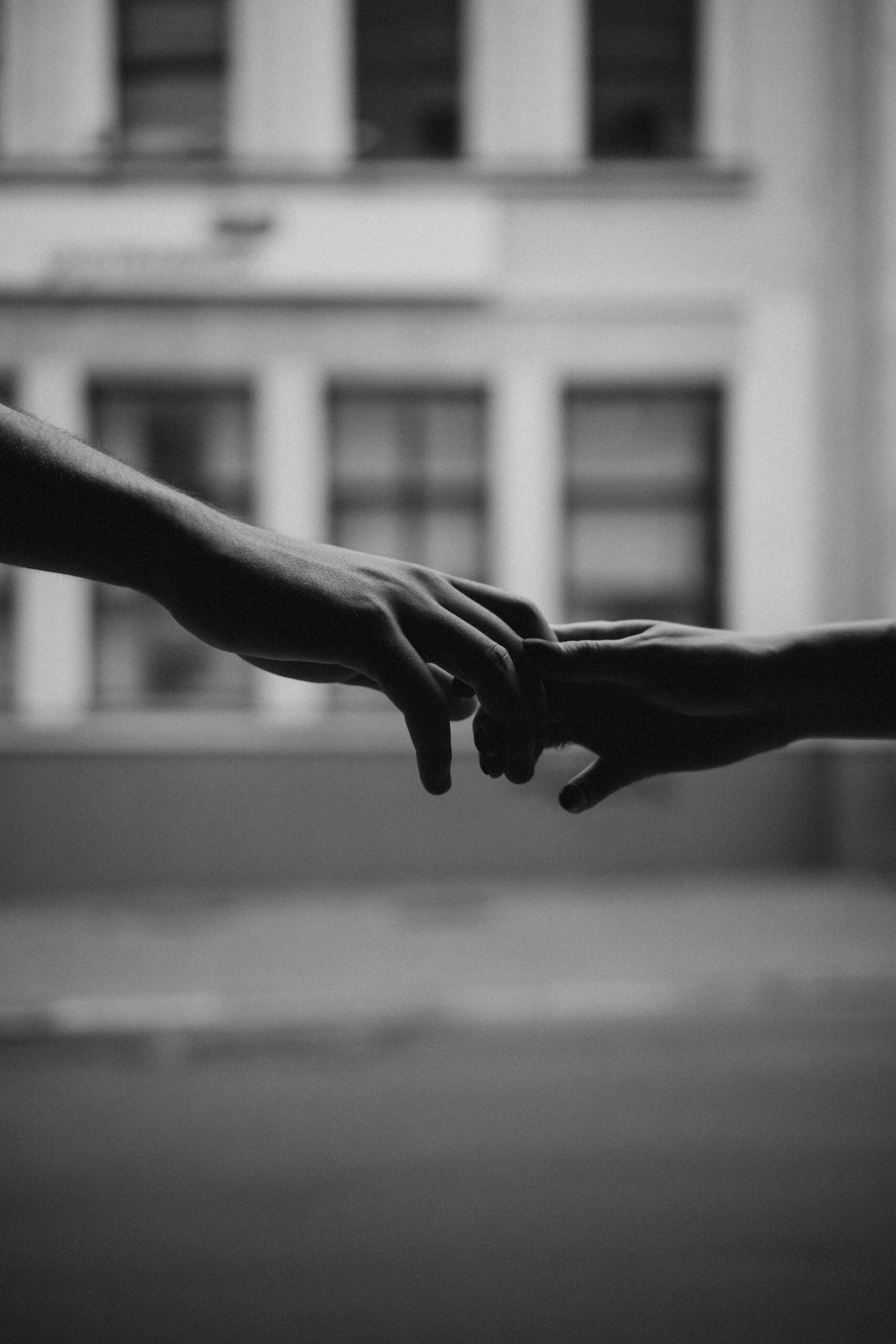 Couple together but with visible emotional distance or tension at New York