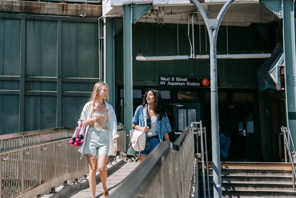 A view of two college bestfriends walking together at New York