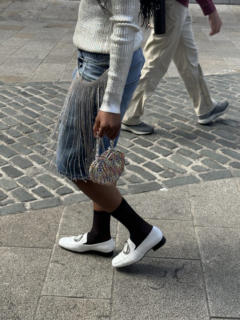 Woman walking on the streets of Manhattan embracing her authenticity